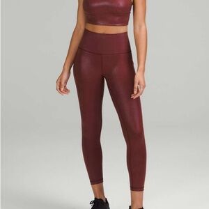 Lululemon Wunder Train HR tights w/pockets 25” Size 4: *Radiate Foil Red Merlot